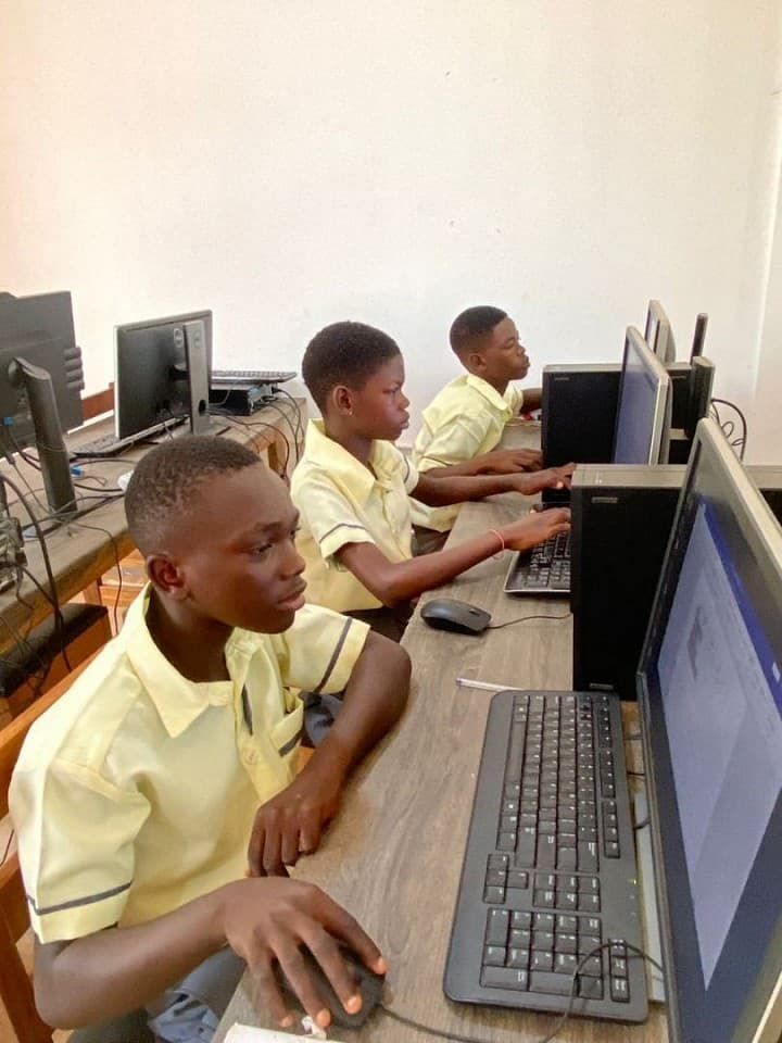 Pupils working on computers in the school's ICT lab