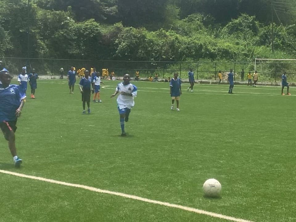 Daffodils girls playing soccer against another school